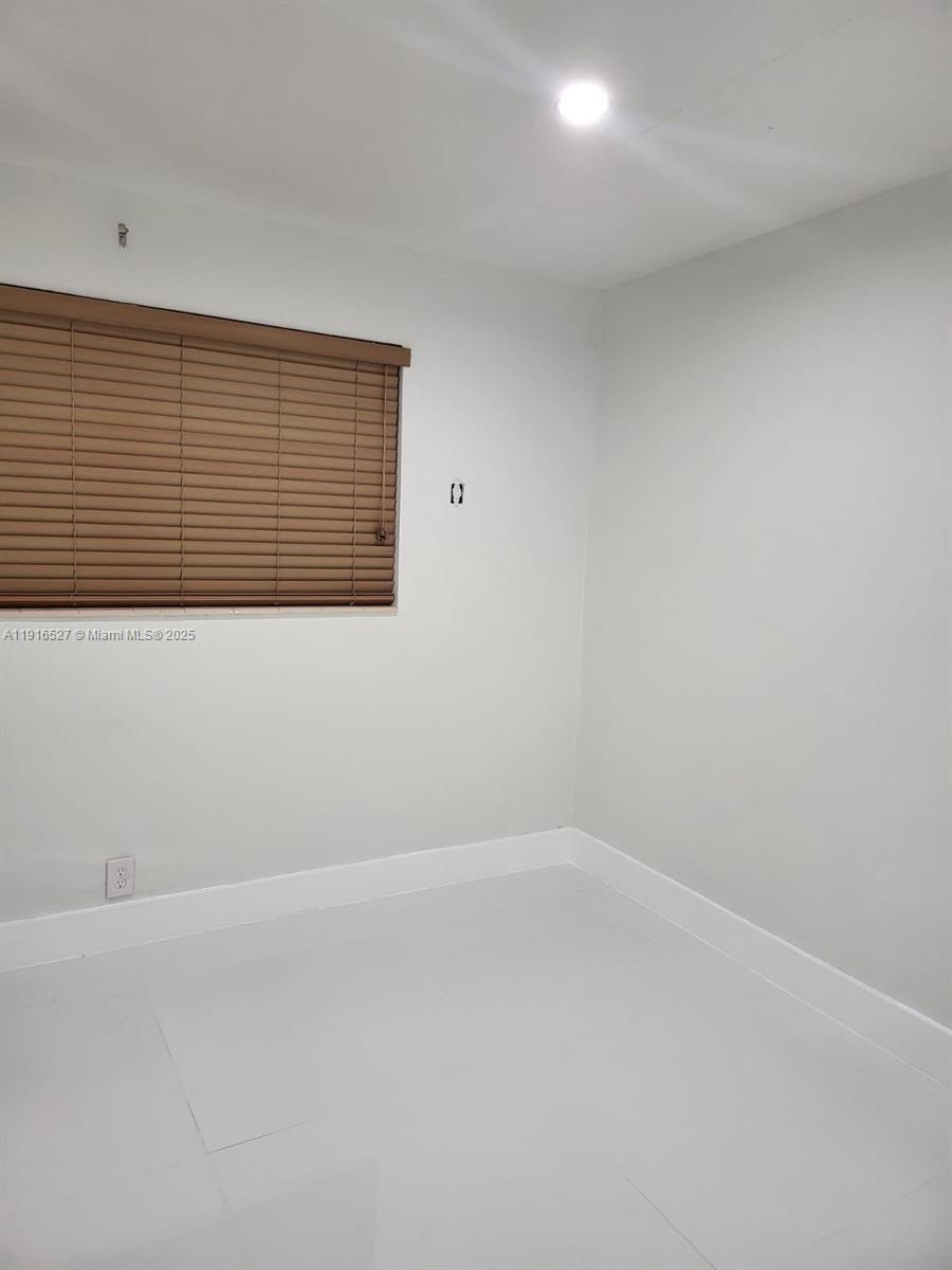 9375 Southwest 40th Terrace, Unit 203 Miami, FL 33165 - Photo 5 of 7 a view of empty room