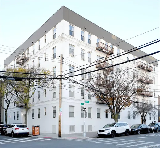 a view of a building with a street