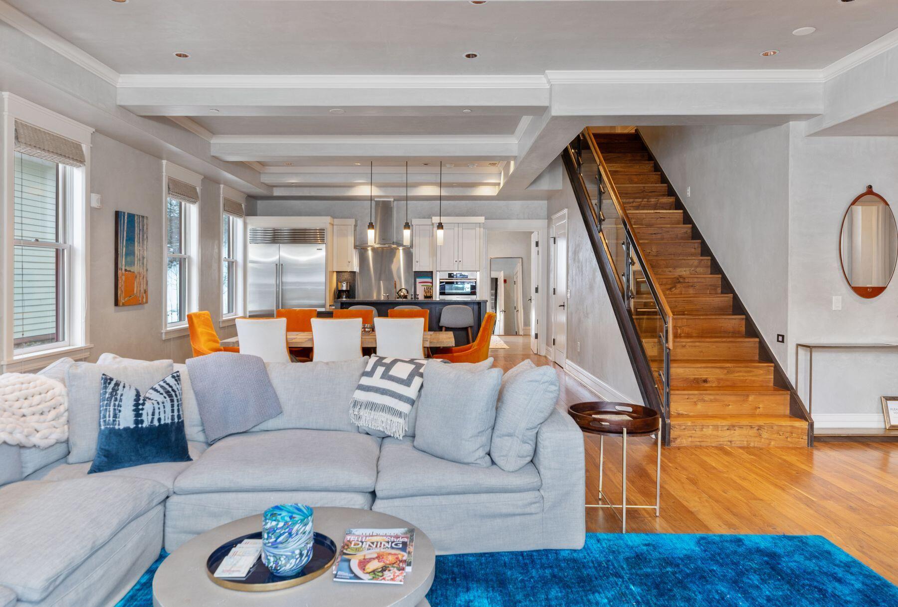 398 South Davis Street, Unit SW402 Telluride, CO 81435 - Photo 2 of 44 a living room with furniture and wooden floor