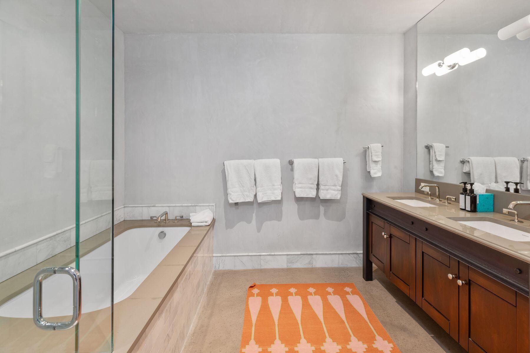 398 South Davis Street, Unit SW402 Telluride, CO 81435 - Photo 43 of 44 a spacious bathroom with a bathtub and a sink