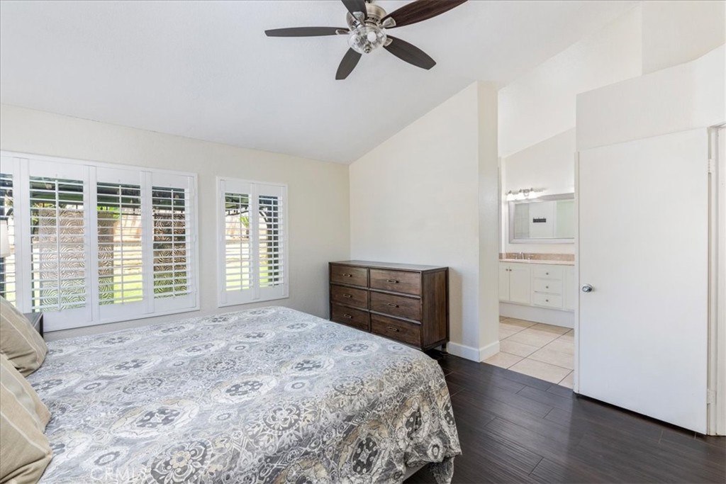 106 Bracebridge Court Riverside, CA 92506 - Photo 19 of 48 a bedroom with a bed and a large window