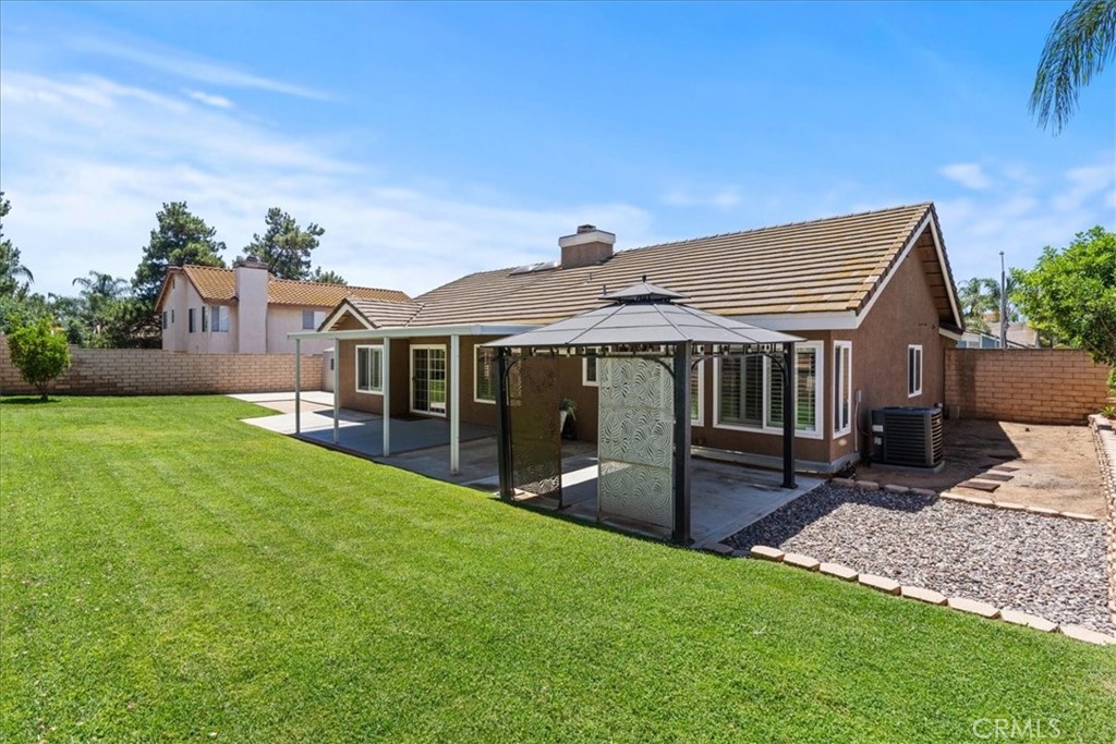 106 Bracebridge Court Riverside, CA 92506 - Photo 29 of 48 a view of a house with a yard and sitting area