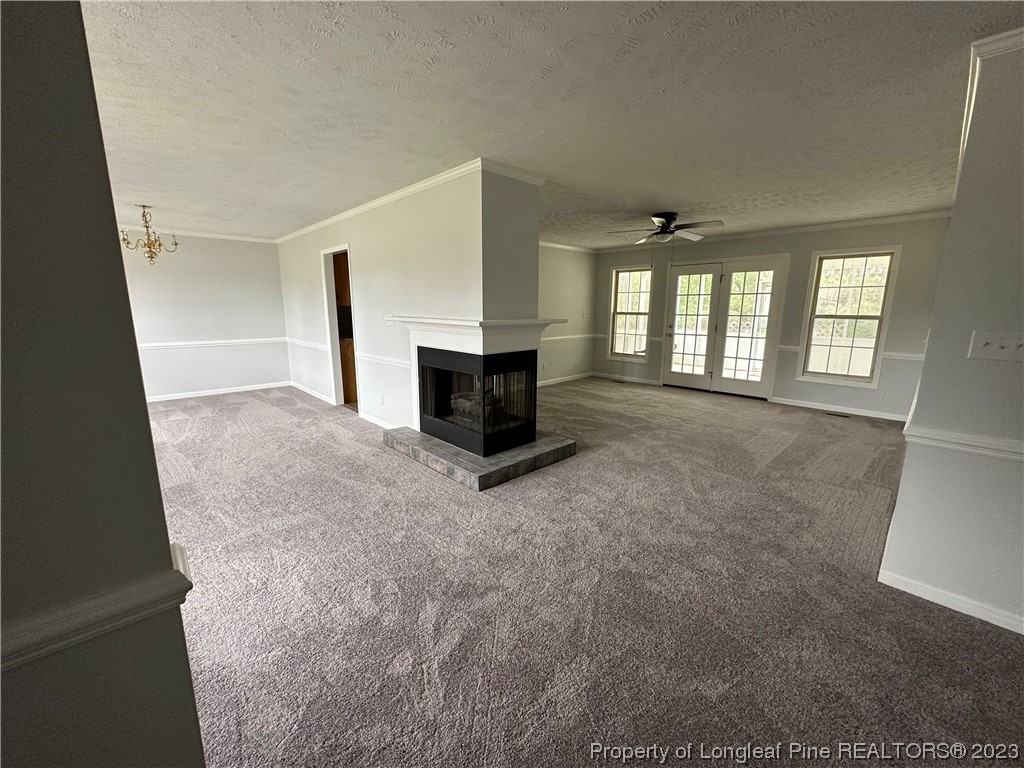 4531 Mobius Road Fayetteville, NC 28312 - Photo 3 of 18 an empty room with windows