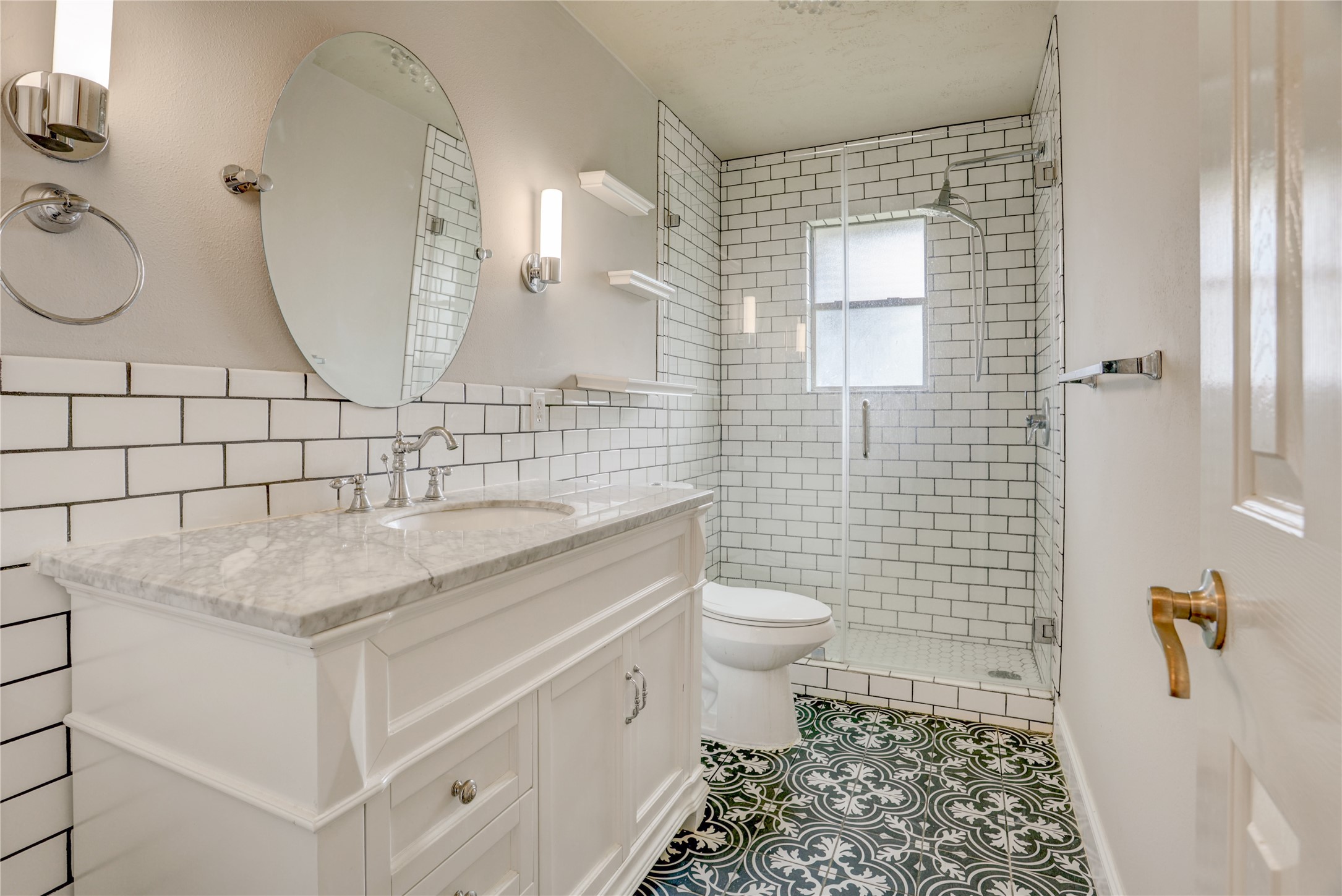 2818 J. R. Drive Manvel, TX 77578 - Photo 19 of 31 An additional bathroom adds everyday functionality and ease for the household.