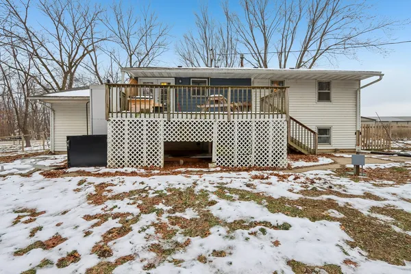 a view of a backyard of the house