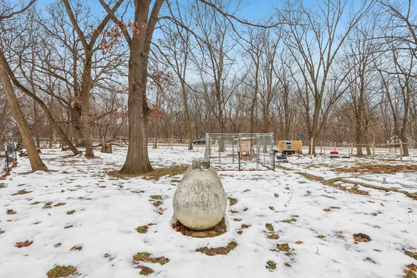a view of a yard with a snow