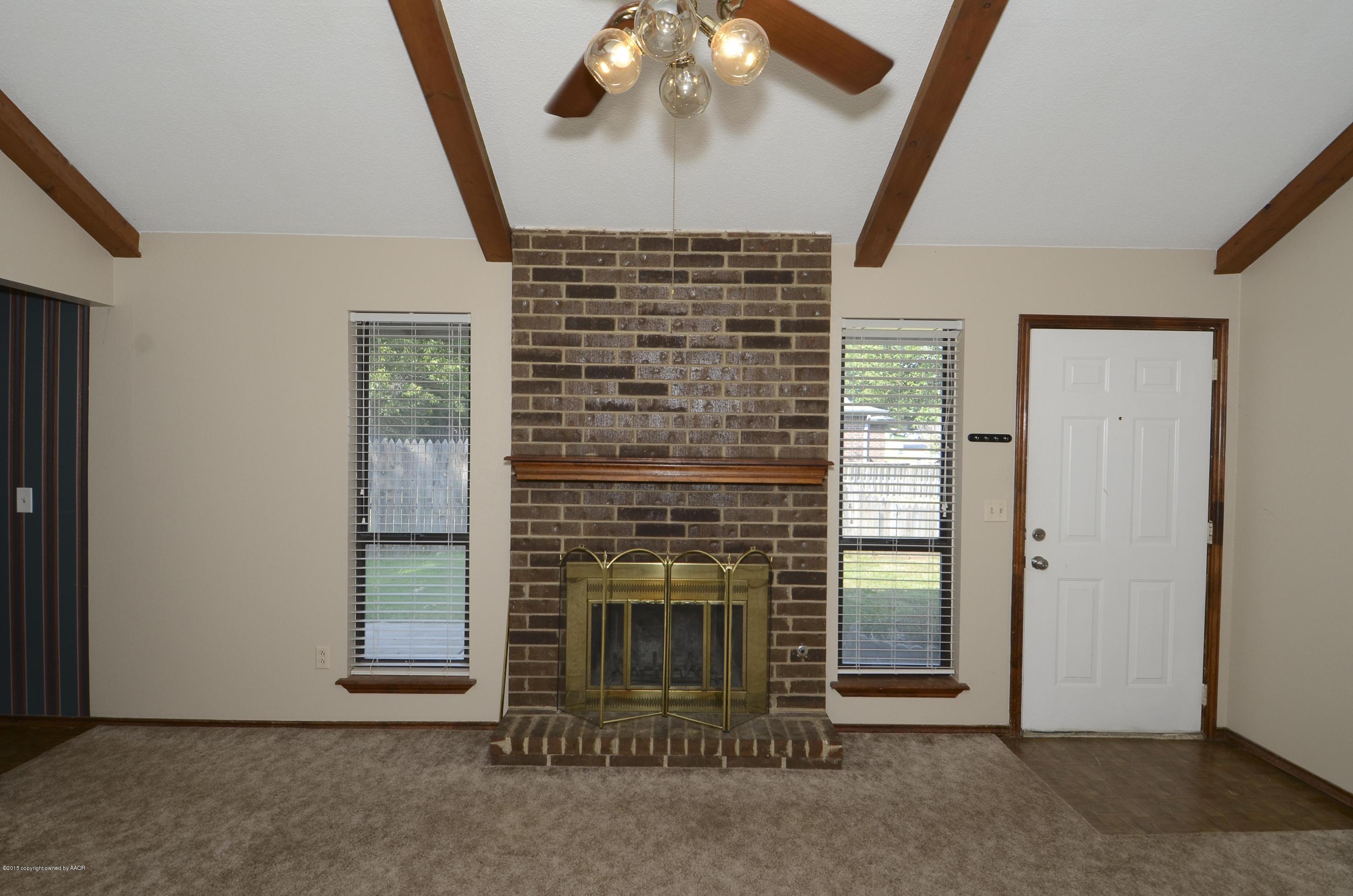 5300 Raindrop Lane Amarillo, TX 79110 - Photo 6 of 25 06 Fireplace