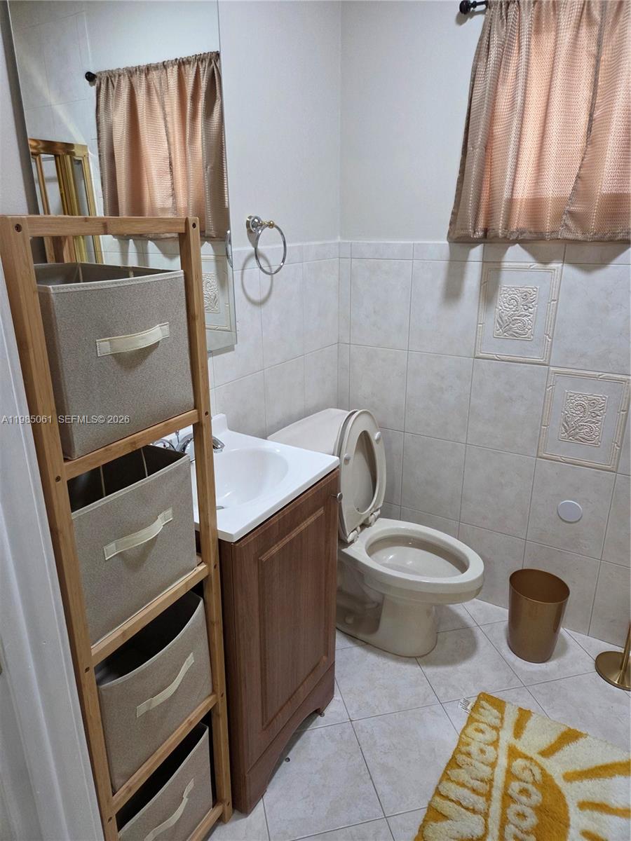 2931 Southwest 135th Avenue Miami, FL 33175 - Photo 18 of 20 a bathroom with a toilet and a sink