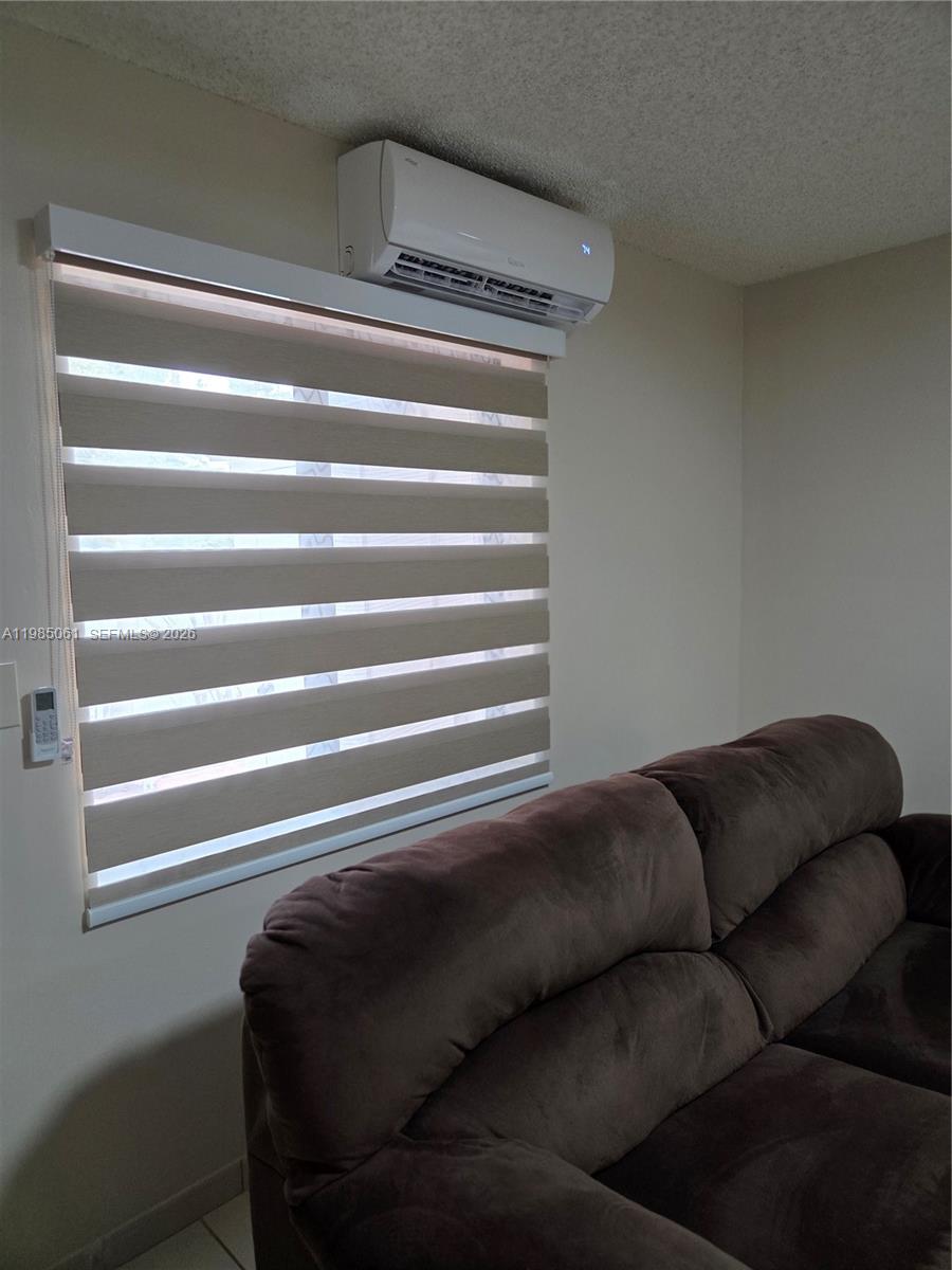 2931 Southwest 135th Avenue Miami, FL 33175 - Photo 6 of 20 a living room with a couch