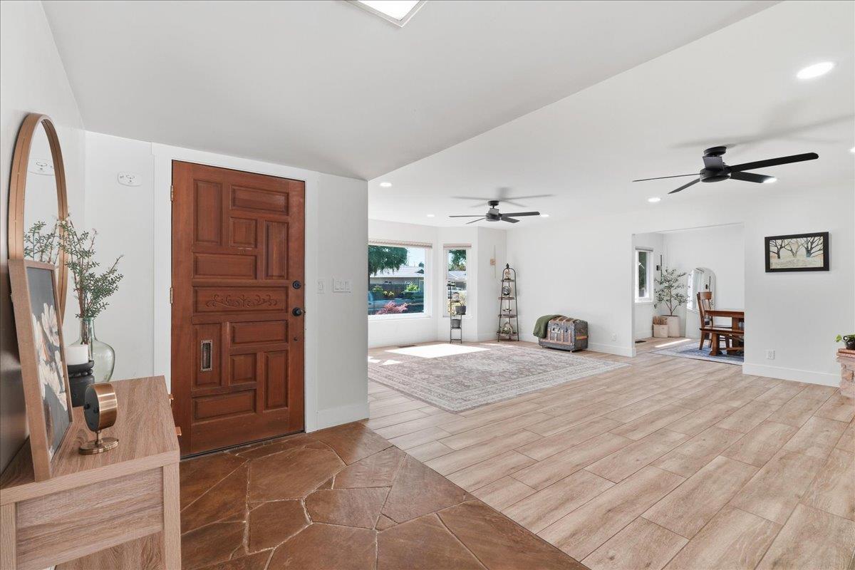 4849 Alexon Way Carmichael, CA 95608 - Photo 5 of 50 a bedroom with a bed dresser and a potted plant