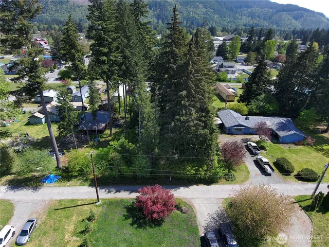an aerial view of a house with a garden