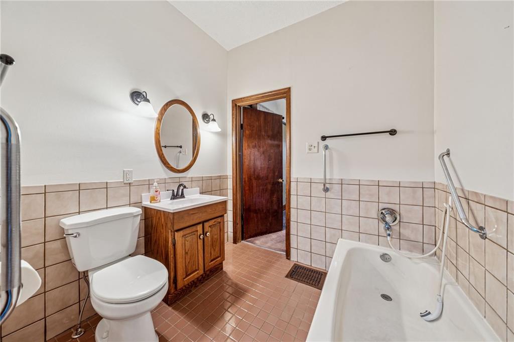 15 Hickory Street Burgettstown, PA 15021 - Photo 20 of 36 a bathroom with a toilet sink and mirror