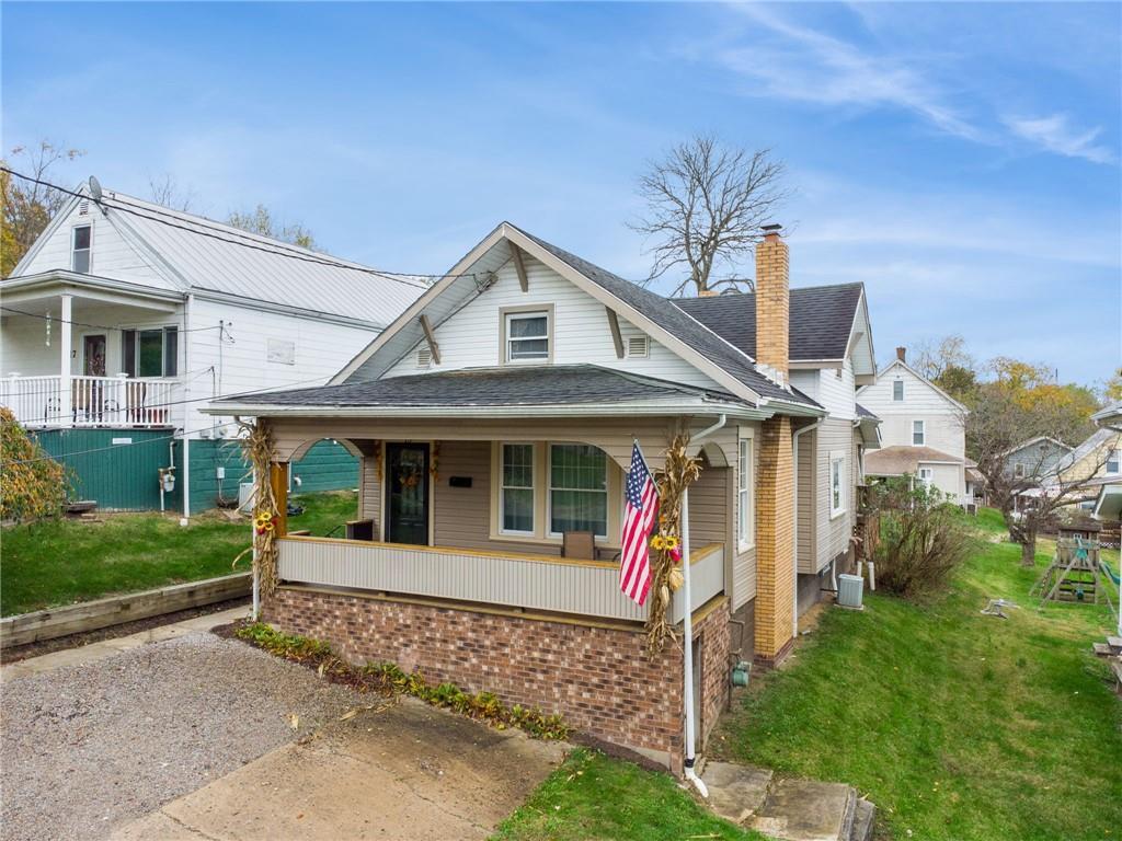 15 Hickory Street Burgettstown, PA 15021 - Photo 2 of 36 a front view of a house with a porch