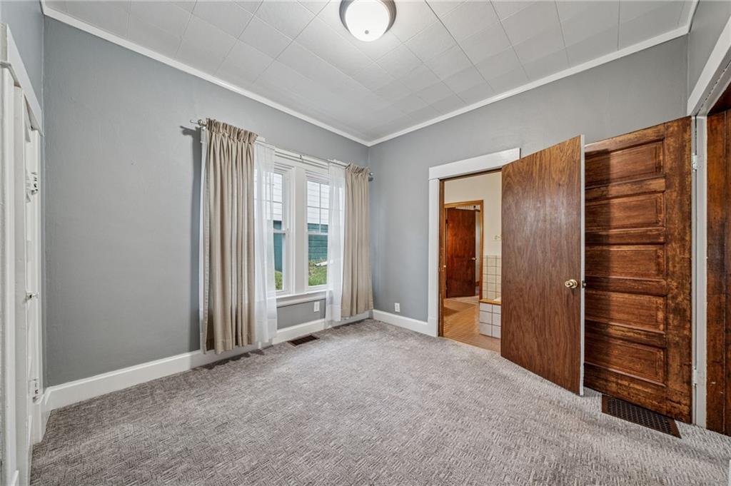 15 Hickory Street Burgettstown, PA 15021 - Photo 21 of 36 an empty room with closet and windows