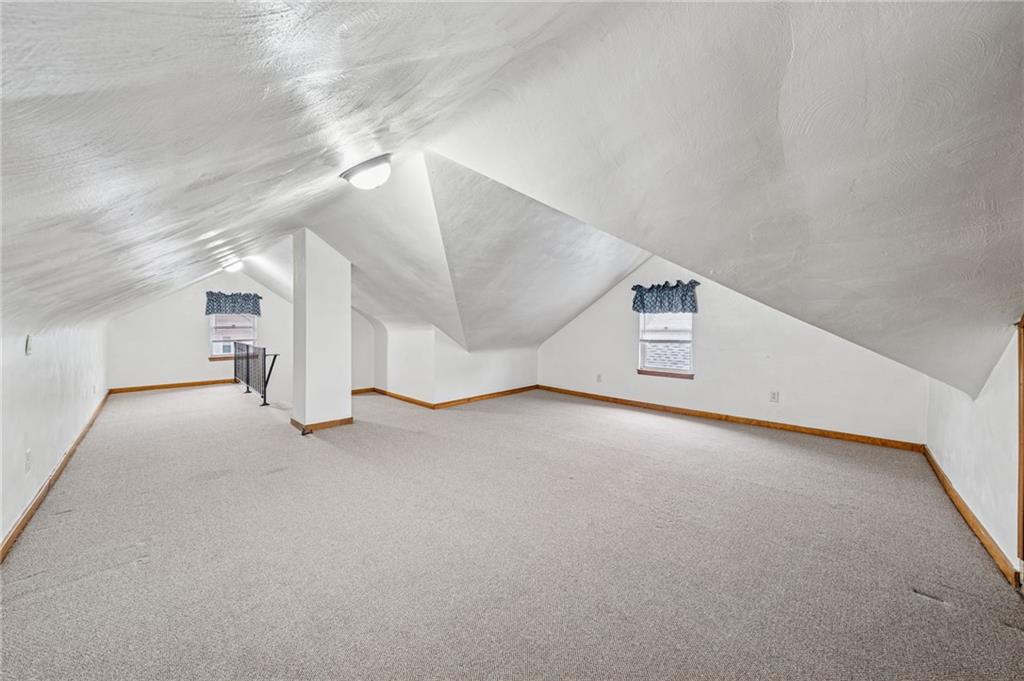 15 Hickory Street Burgettstown, PA 15021 - Photo 26 of 36 a view of a big room with closet and windows