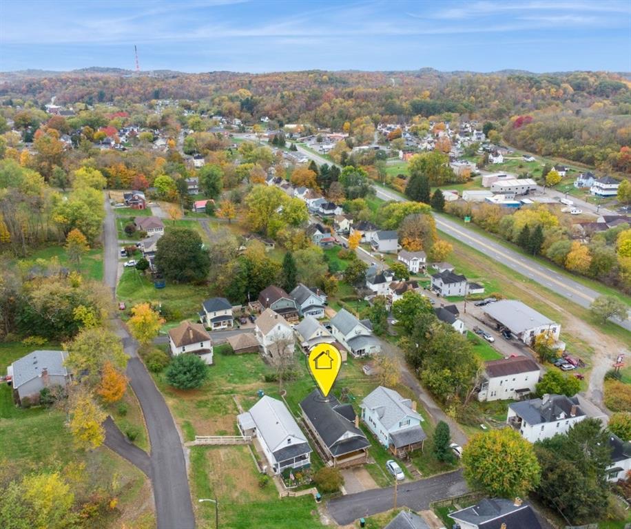 15 Hickory Street Burgettstown, PA 15021 - Photo 36 of 36 an aerial view of lake residential house with swimming pool and green space