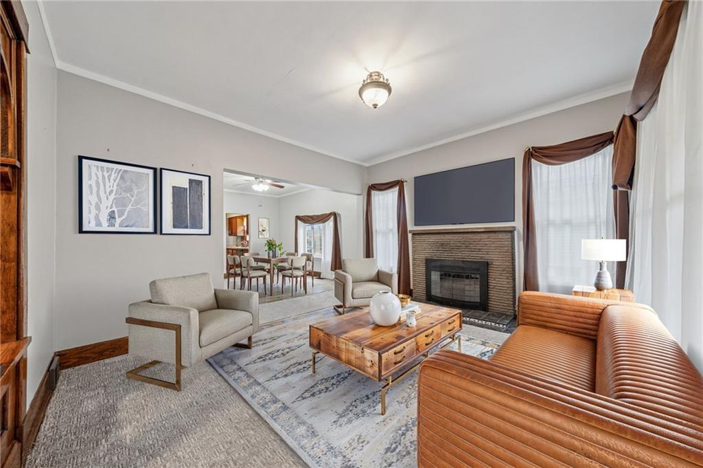 15 Hickory Street Burgettstown, PA 15021 - Photo 8 of 36 a living room with furniture and a fireplace