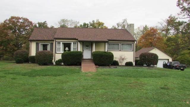 2025 Eastbrook Road New Castle, PA 16101 - Photo 1 of 20 a view of a house with a yard and plants