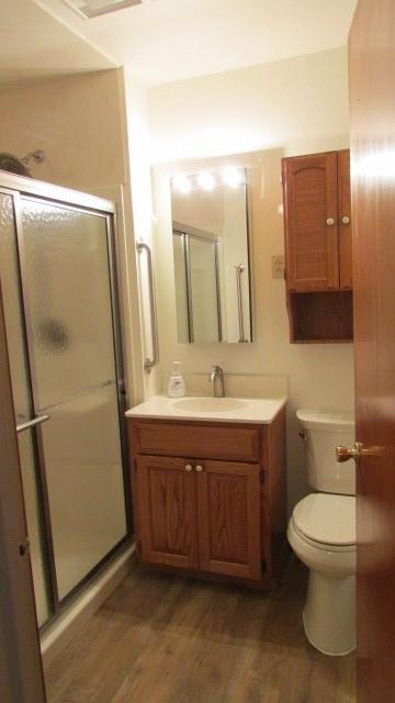 2025 Eastbrook Road New Castle, PA 16101 - Photo 9 of 20 a bathroom with a sink a mirror a toilet and vanity