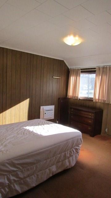 2025 Eastbrook Road New Castle, PA 16101 - Photo 10 of 20 a bedroom with a bed and a dresser