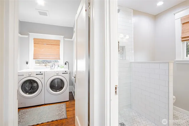 a bedroom with a bed and a fireplace