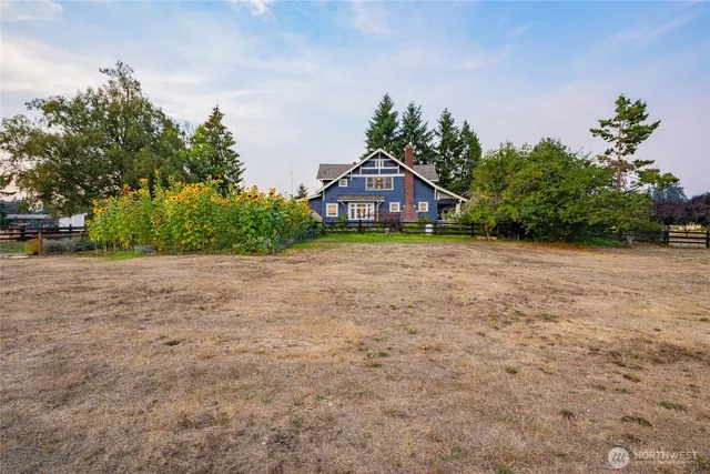 a kitchen with a sink stove and microwave