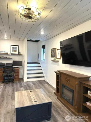 a bathroom with a sink vanity and a mirror