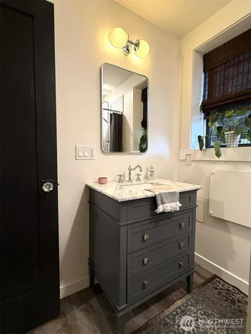a bathroom with a sink and bathtub
