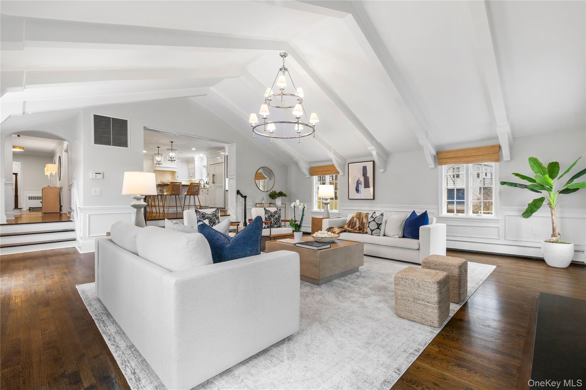37 Bates Road Harrison, NY 10528 - Photo 14 of 41 a living room with fireplace furniture and a chandelier
