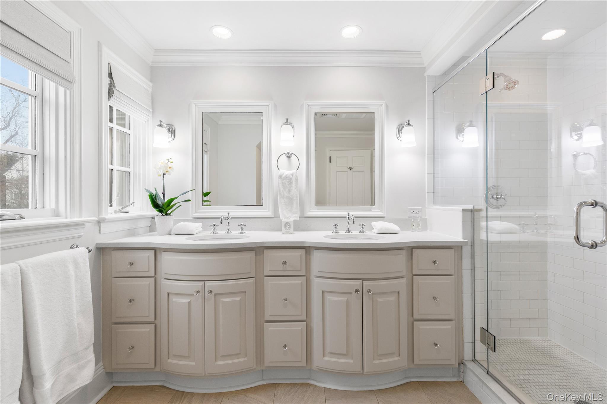 37 Bates Road Harrison, NY 10528 - Photo 19 of 41 a bathroom with a granite countertop sink and a mirror