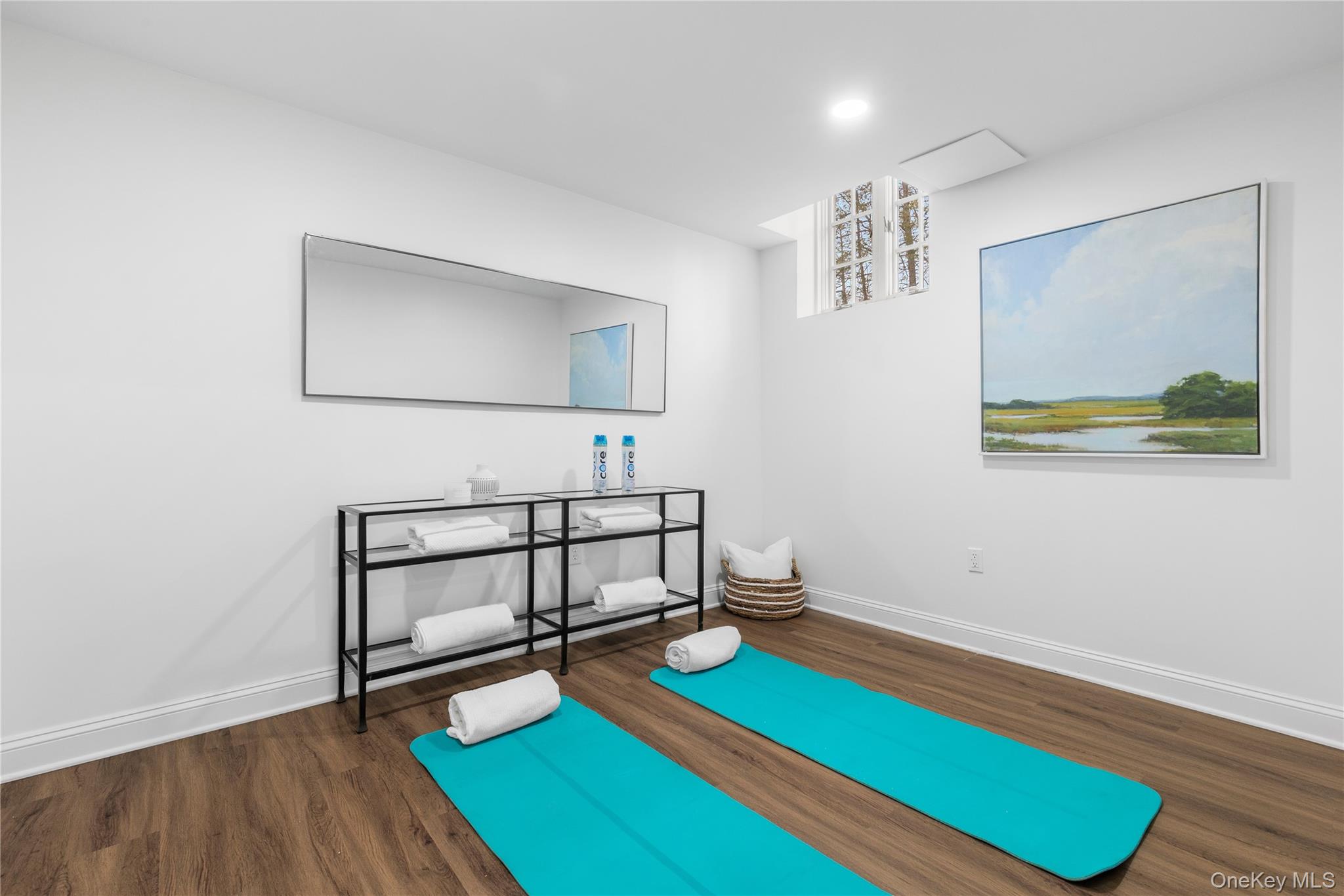 37 Bates Road Harrison, NY 10528 - Photo 29 of 41 a room with furniture and a wooden floor