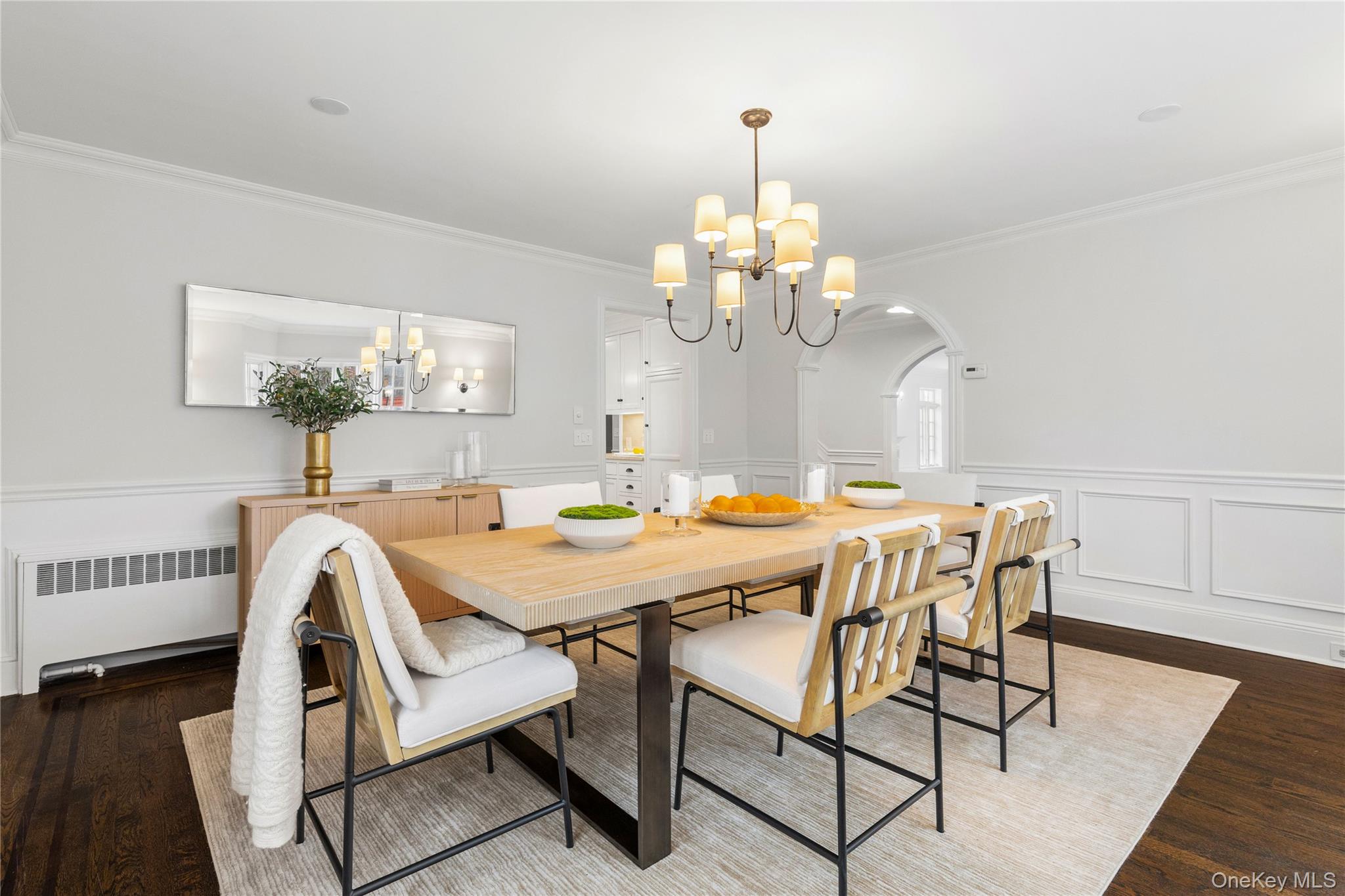37 Bates Road Harrison, NY 10528 - Photo 10 of 41 a view of a dining room with furniture and wooden floor