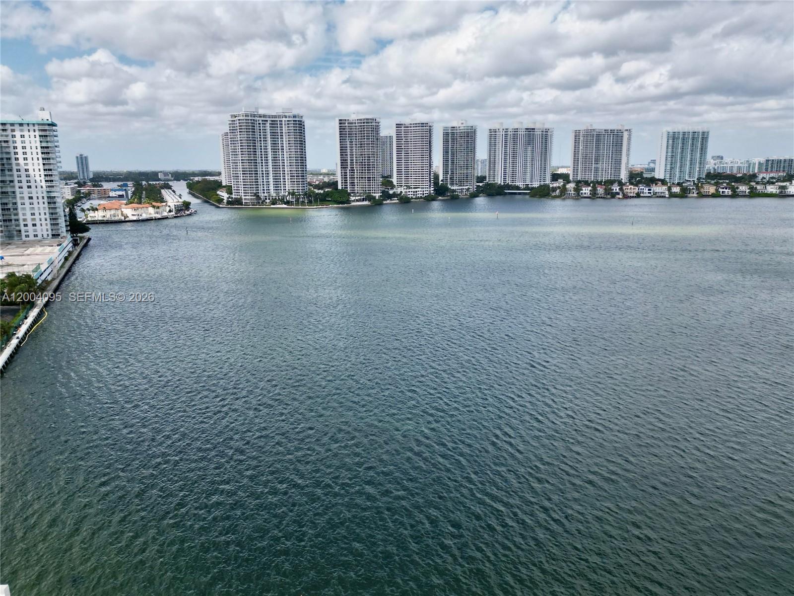 17500 North Bay Road, Unit S907 Sunny Isles Beach, FL 33160 - Photo 3 of 24 a view of a city from a balcony