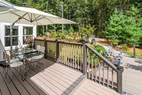 a view of outdoor sitting area with chairs