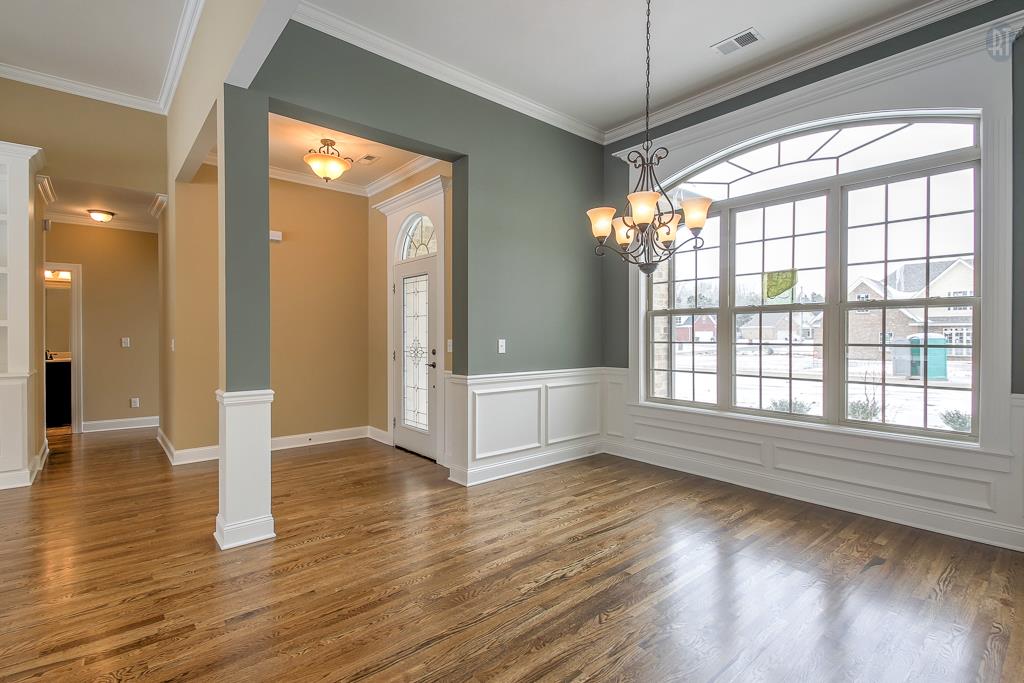 1208 Rimrock Road Smyrna, TN 37167 - Photo 4 of 20 a view of an empty room with window and wooden floor
