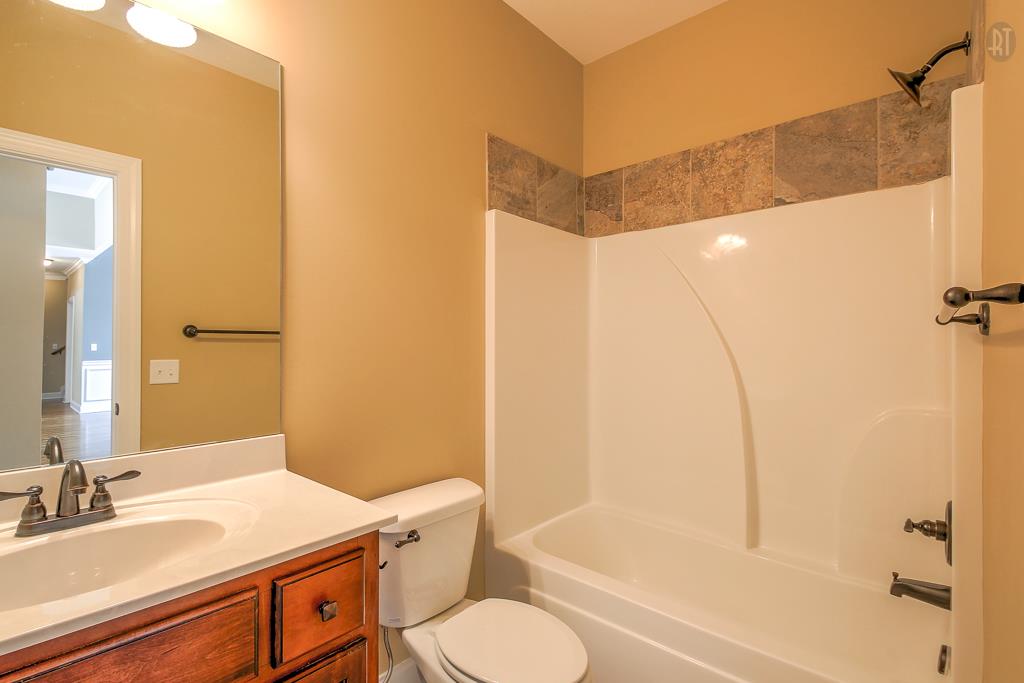 1208 Rimrock Road Smyrna, TN 37167 - Photo 10 of 20 a bathroom with a sink toilet and shower