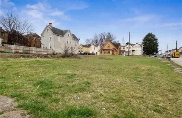 a house view with garden space