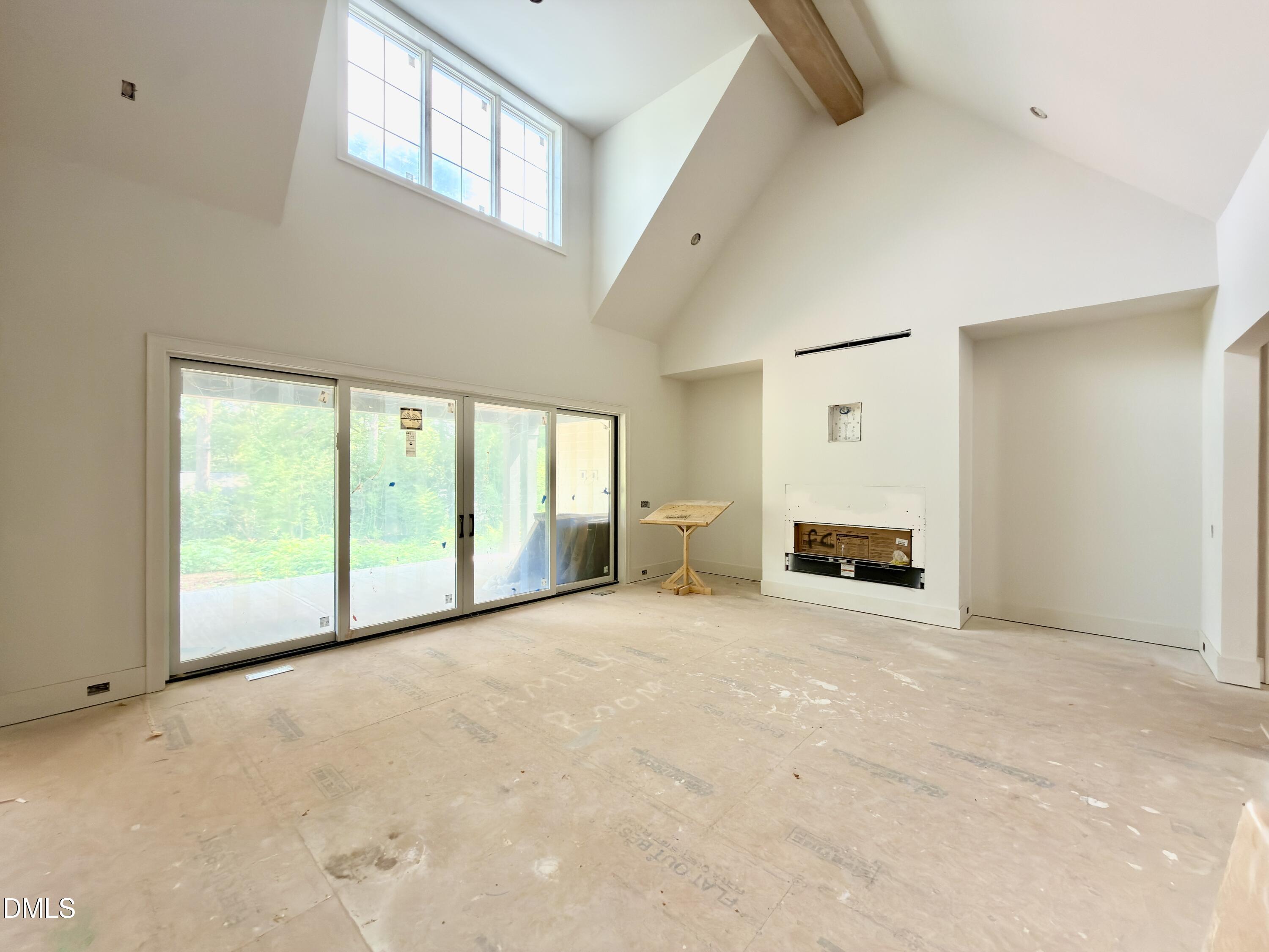 3422 Redbud Lane Raleigh, NC 27607 - Photo 9 of 59 a view of an empty room with a window