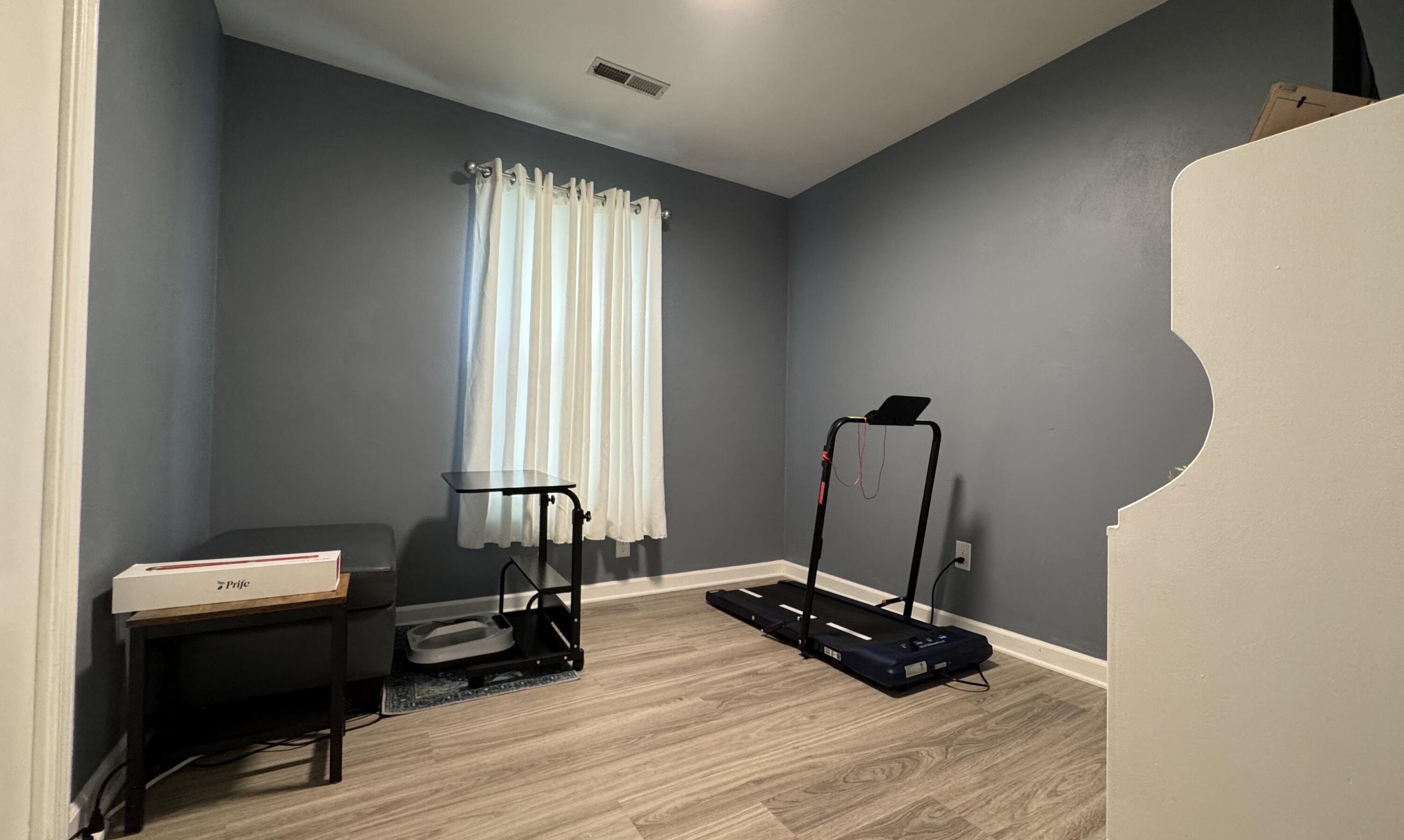 2917 Elderwood Road Salem, VA 24153 - Photo 12 of 24 a view of a workspace with furniture and a window