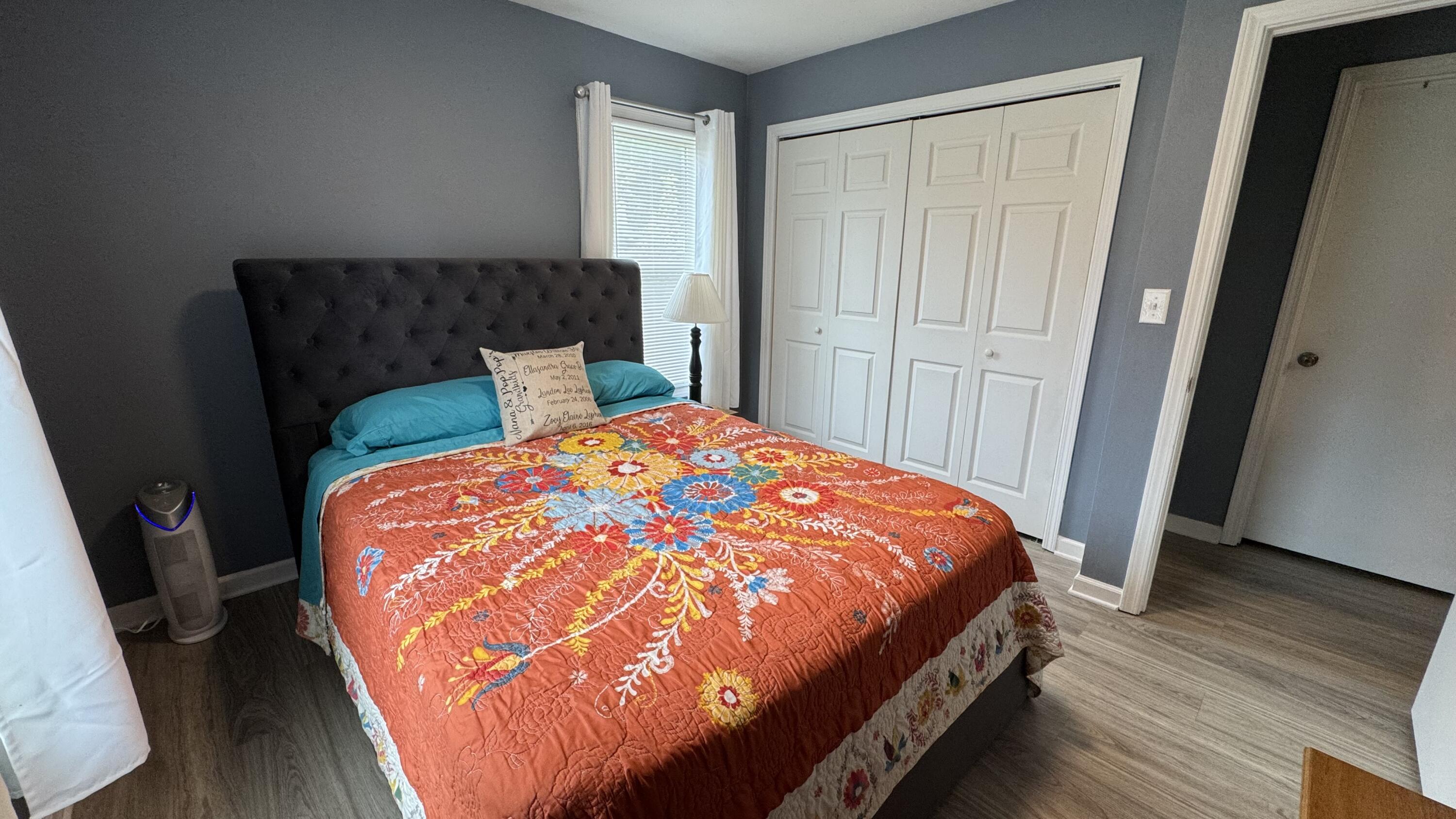 2917 Elderwood Road Salem, VA 24153 - Photo 16 of 24 a bed sitting in a bedroom next to a window