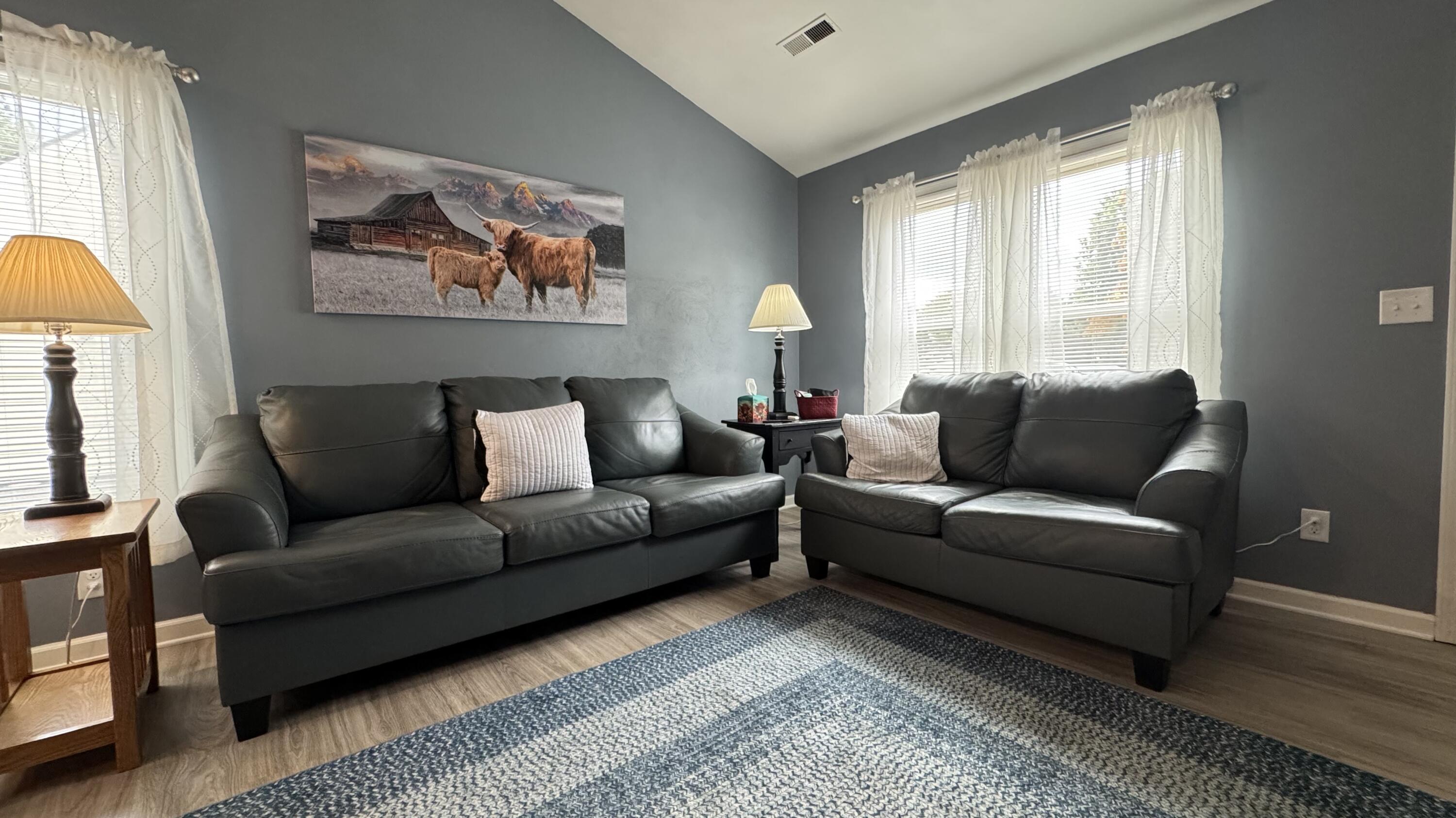 2917 Elderwood Road Salem, VA 24153 - Photo 7 of 24 a living room with furniture and a large window