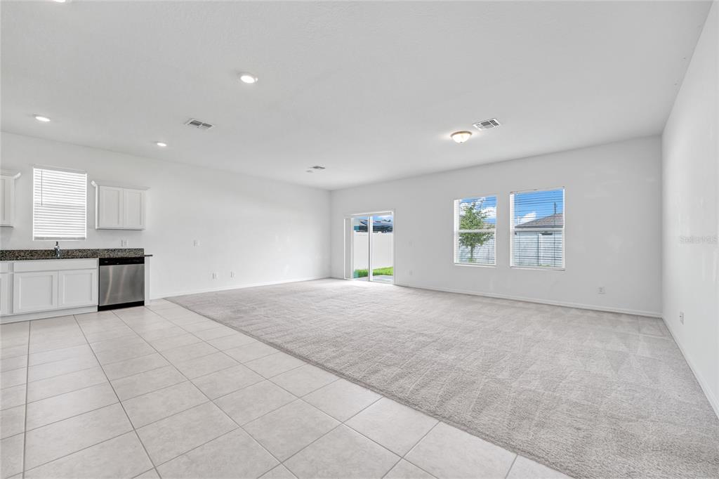 5875 Herder Road St. Cloud, FL 34771 - Photo 12 of 42 a view of an empty room with a window