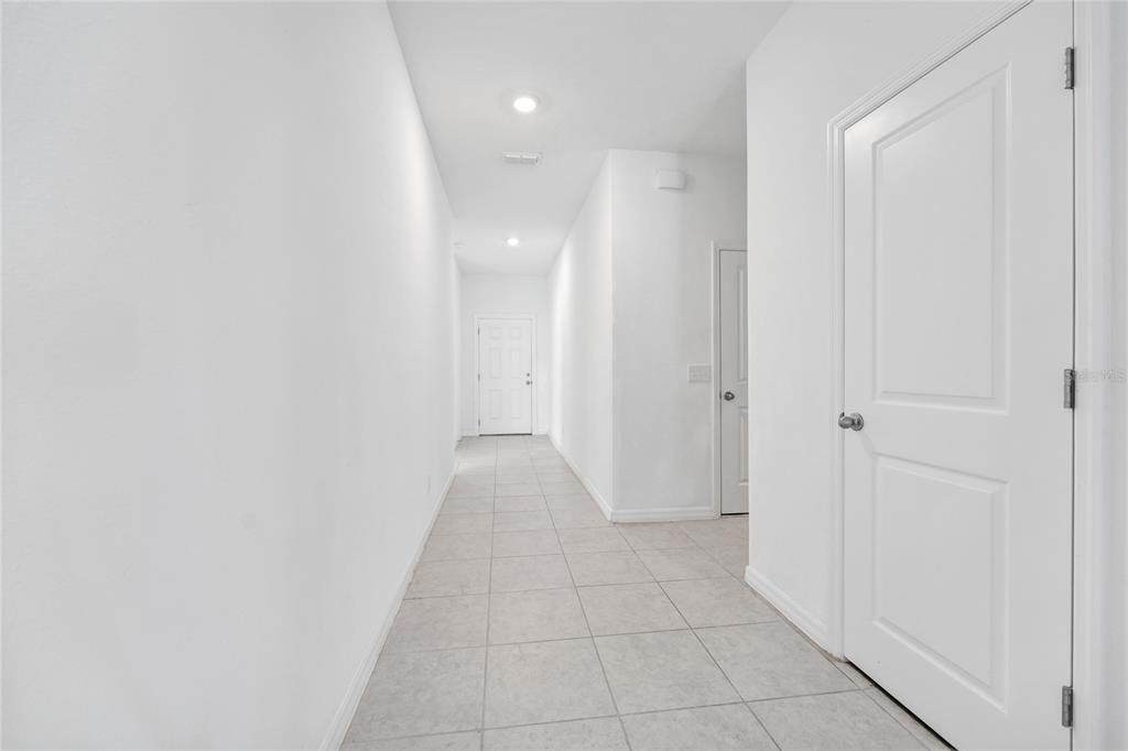5875 Herder Road St. Cloud, FL 34771 - Photo 17 of 42 a view of a hallway with a shower