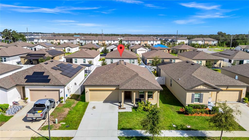 5875 Herder Road St. Cloud, FL 34771 - Photo 2 of 42 an aerial view of multiple houses