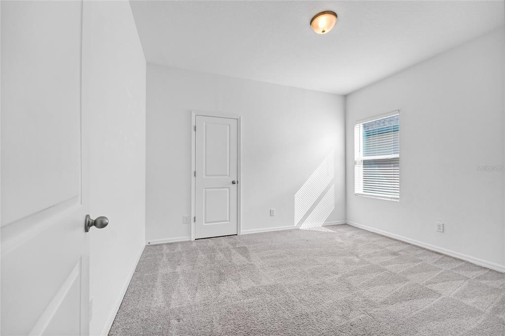 5875 Herder Road St. Cloud, FL 34771 - Photo 22 of 42 a view of room with window