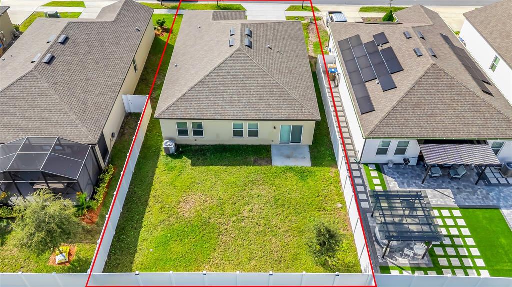 5875 Herder Road St. Cloud, FL 34771 - Photo 30 of 42 an aerial view of multiple houses with yard