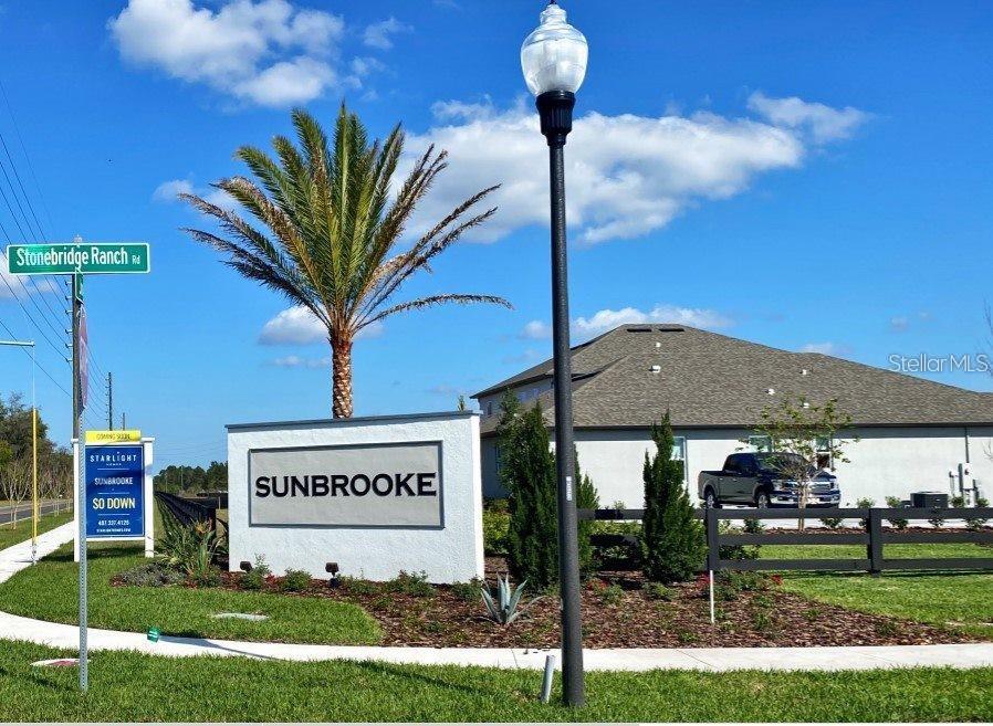 5875 Herder Road St. Cloud, FL 34771 - Photo 33 of 42 a sign on the side of the building