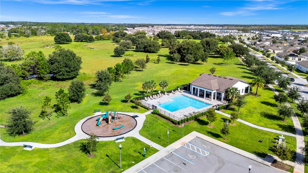 5875 Herder Road St. Cloud, FL 34771 - Photo 37 of 42 an aerial view of a house with garden space and outdoor seating