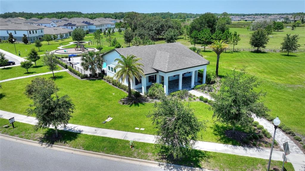 5875 Herder Road St. Cloud, FL 34771 - Photo 41 of 42 an aerial view of a house with a yard