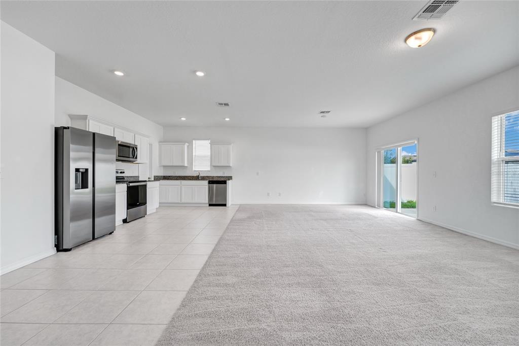 5875 Herder Road St. Cloud, FL 34771 - Photo 6 of 42 a big room with closet and windows